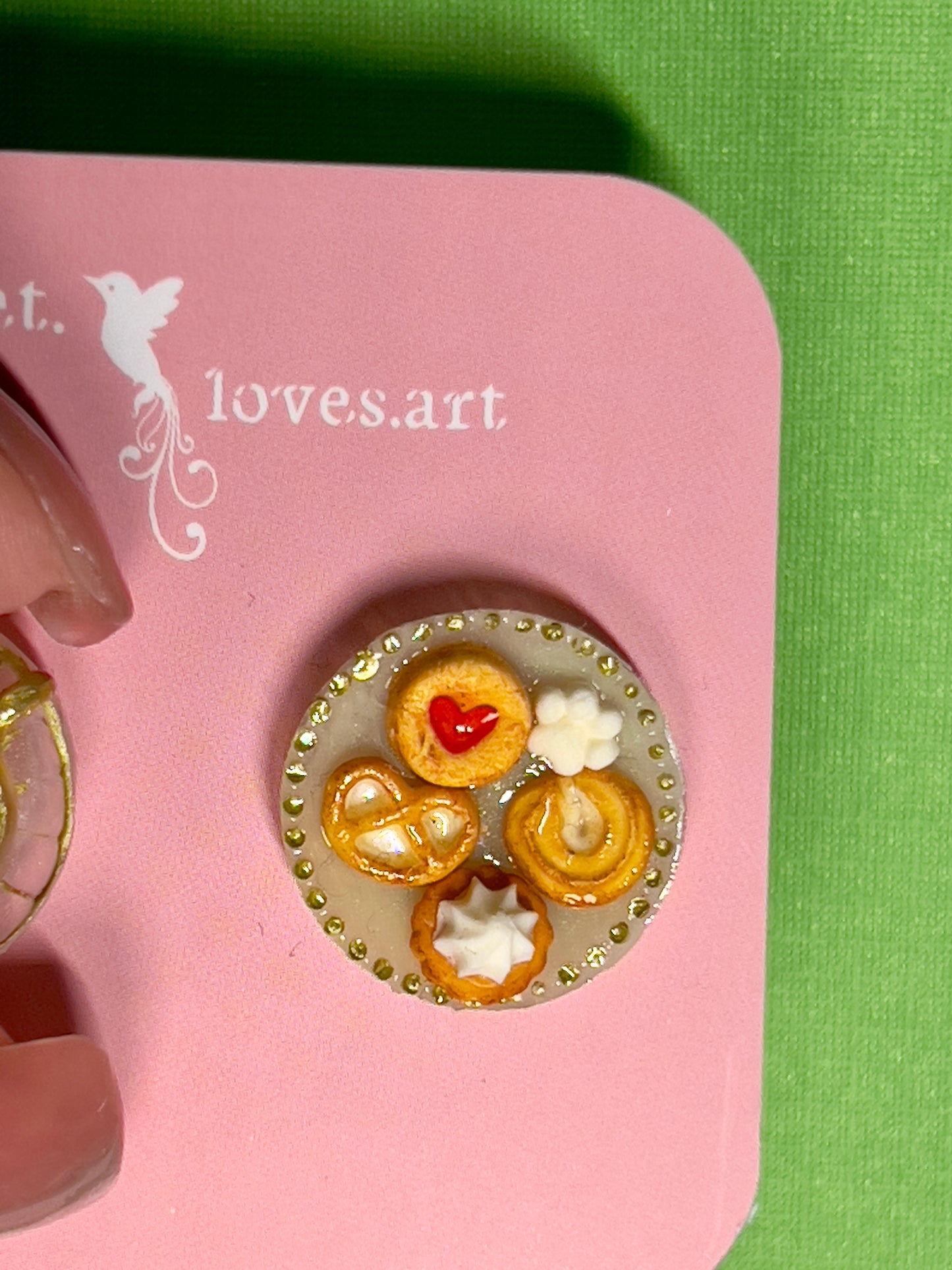 030 - Mini white opaque teacup, white saucer of cookies and white chocolate