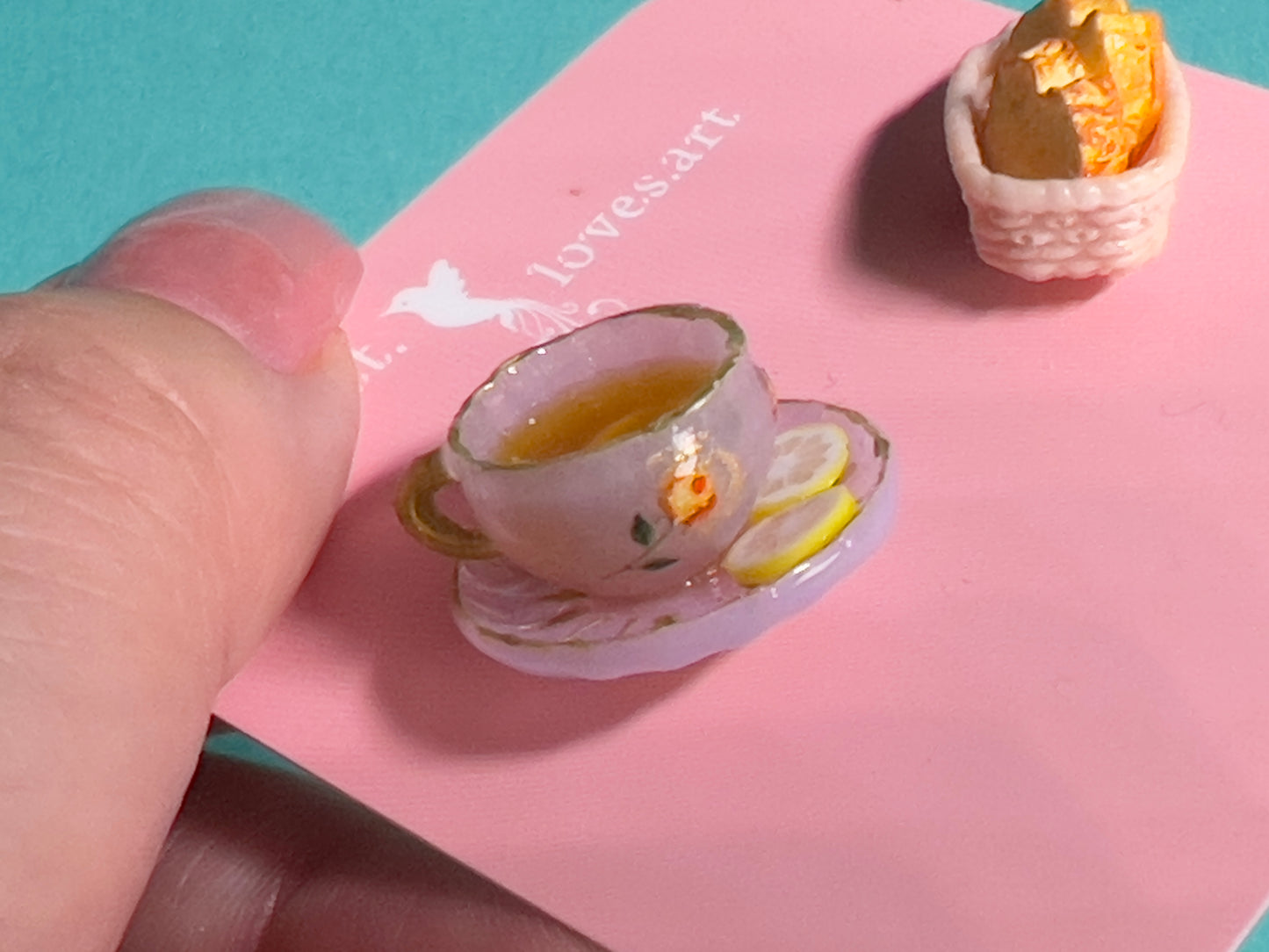 011 - Mini light purple teacup and buttered toasts in basket