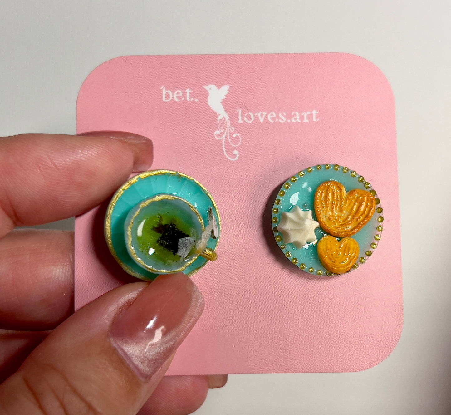007 - Mini teal teacup with tea bag, teal saucer with palmiers and meringue