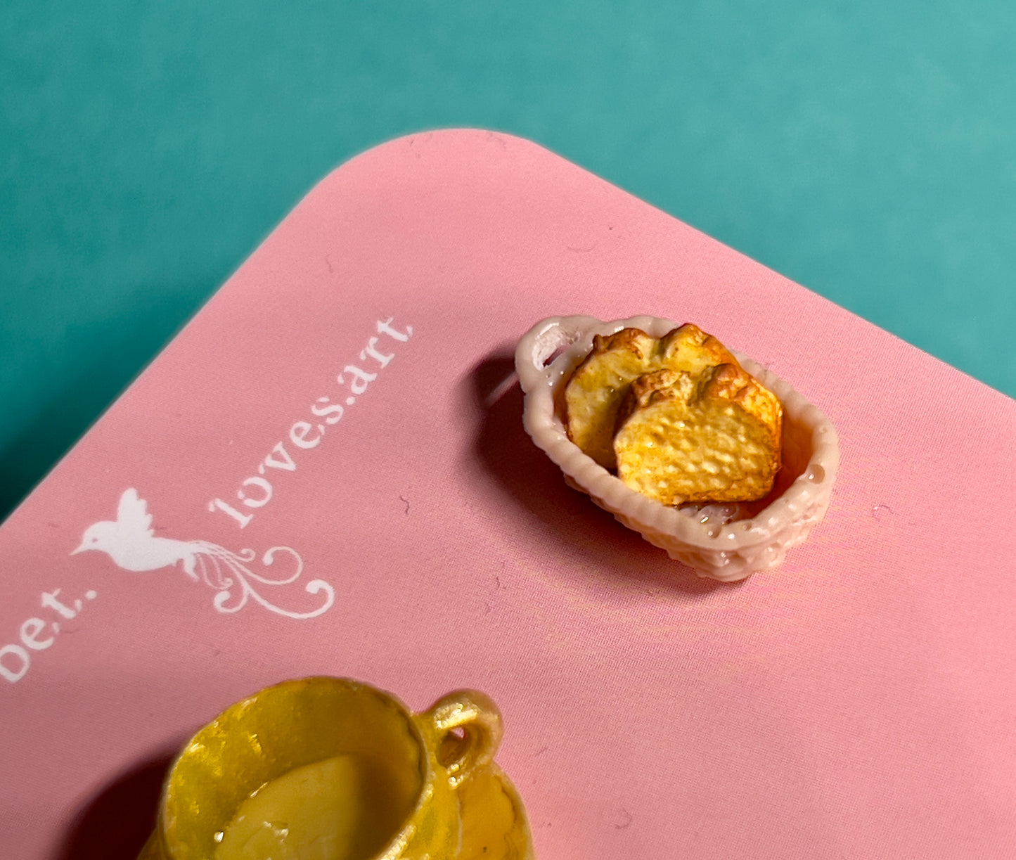 013 - Mini yellow teacup and buttered toasts in basket