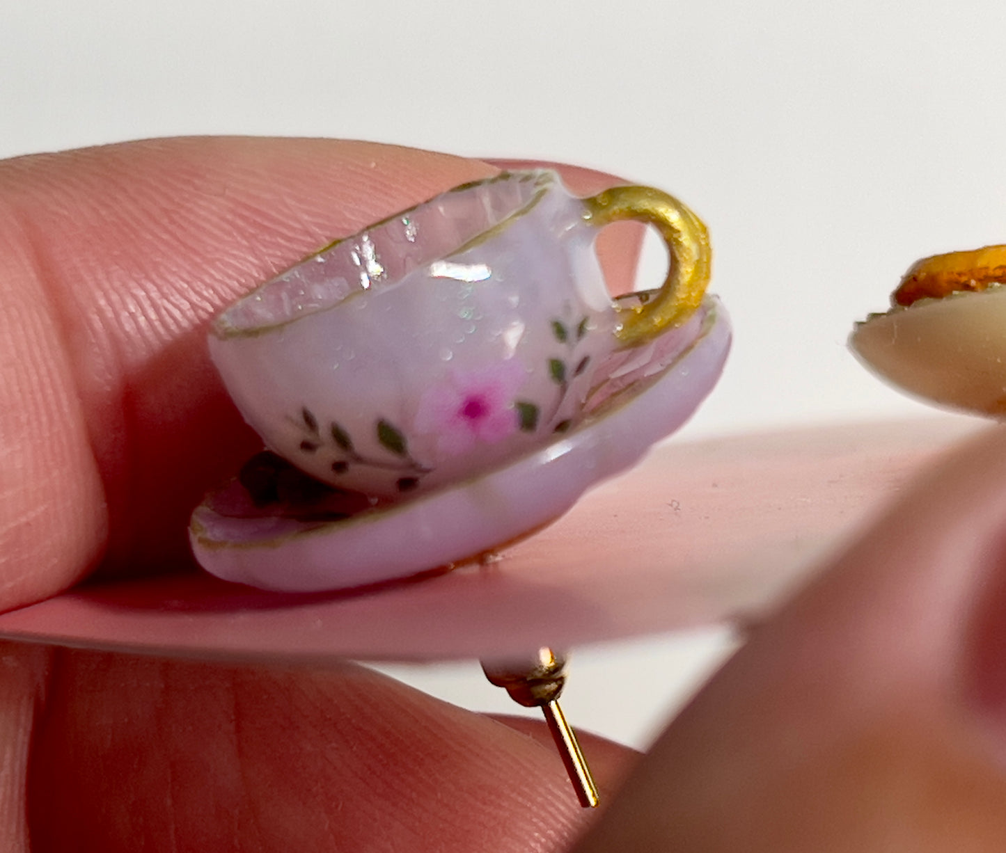 018 - Mini light purple teacup with chocolate and cookies on yellow saucer