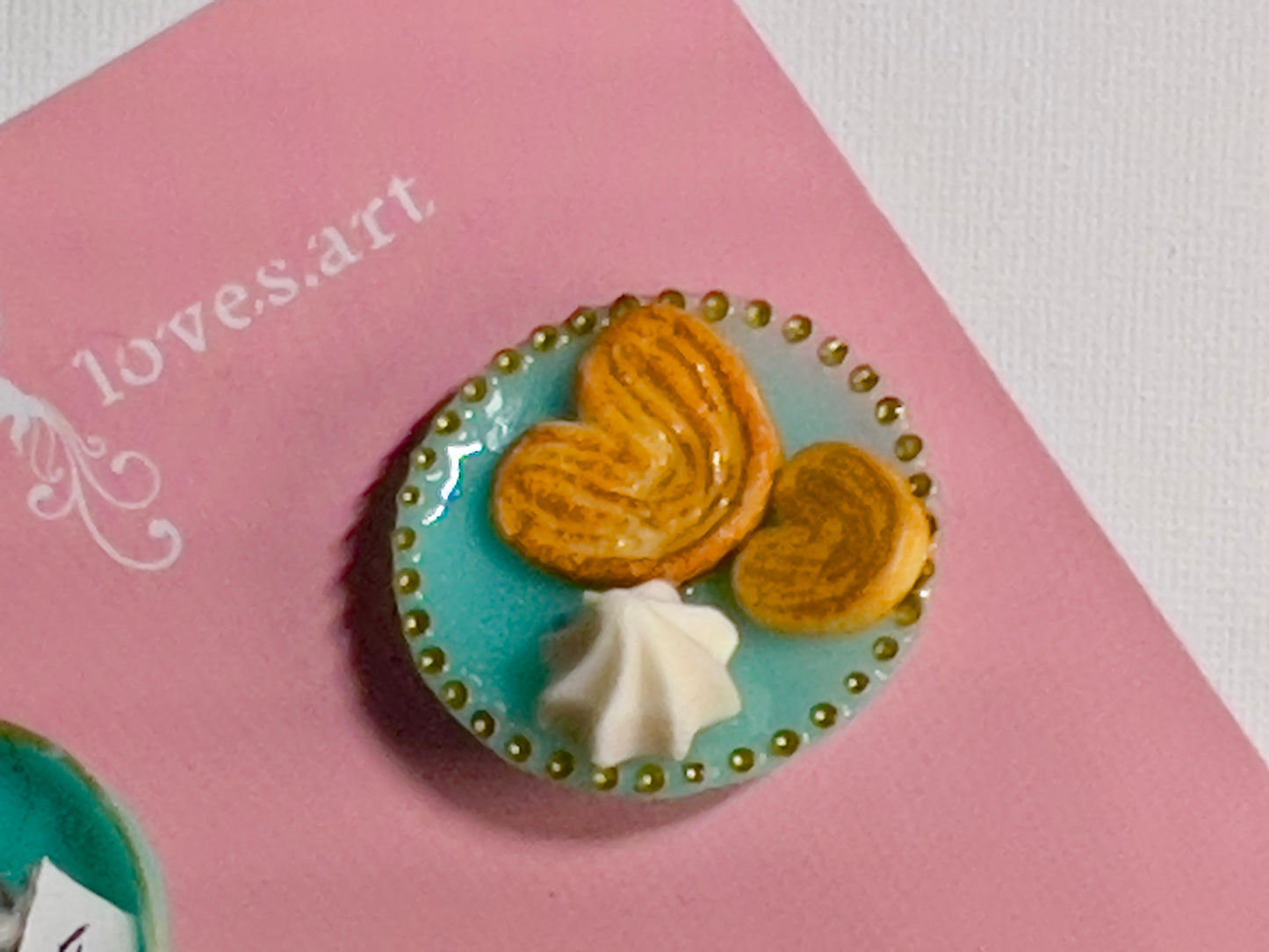007 - Mini teal teacup with tea bag, teal saucer with palmiers and meringue