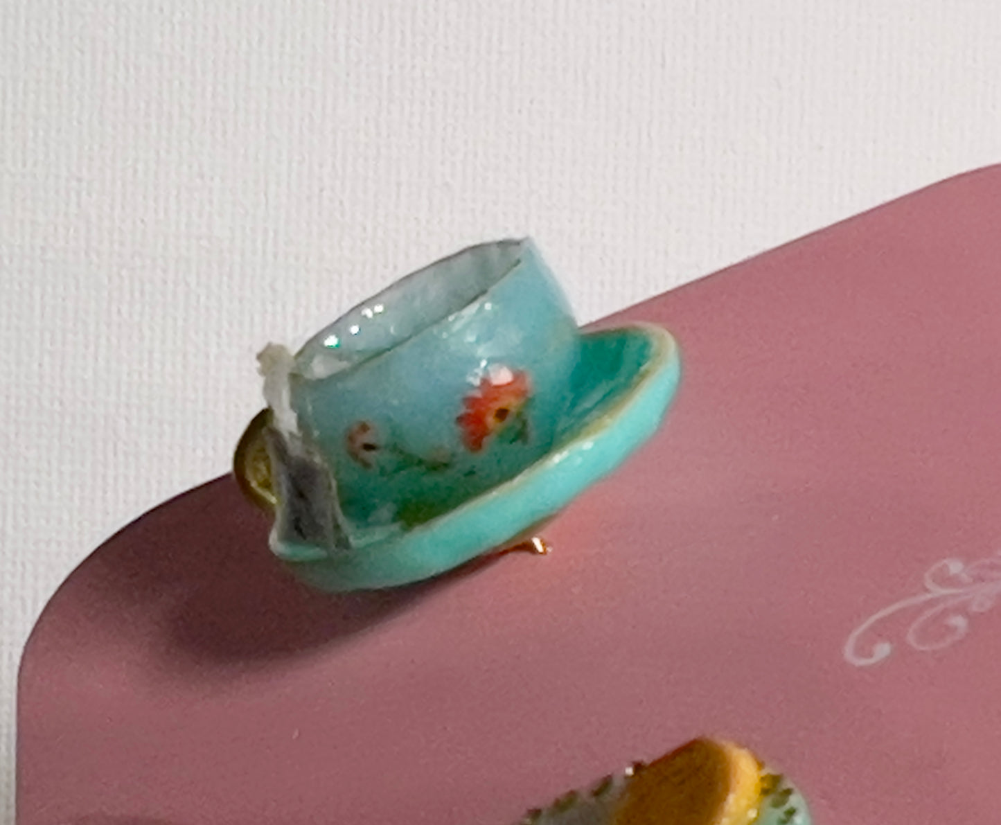 007 - Mini teal teacup with tea bag, teal saucer with palmiers and meringue