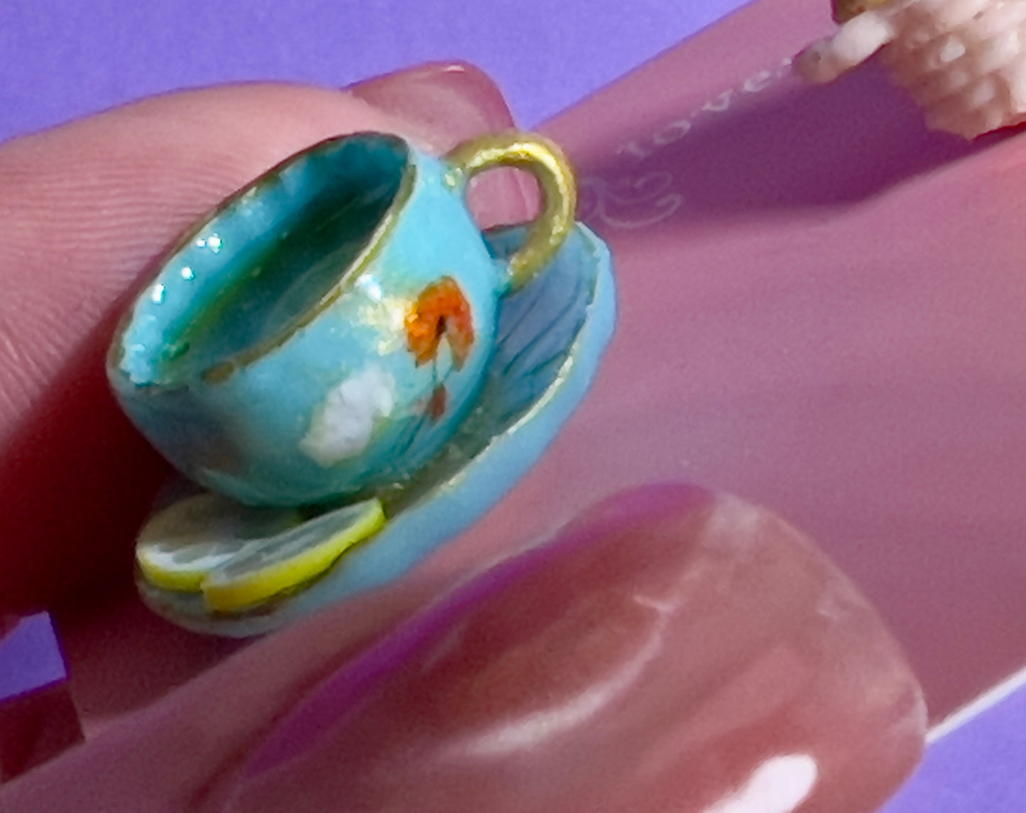 017 - Mini teal teacup and a basket of toasts