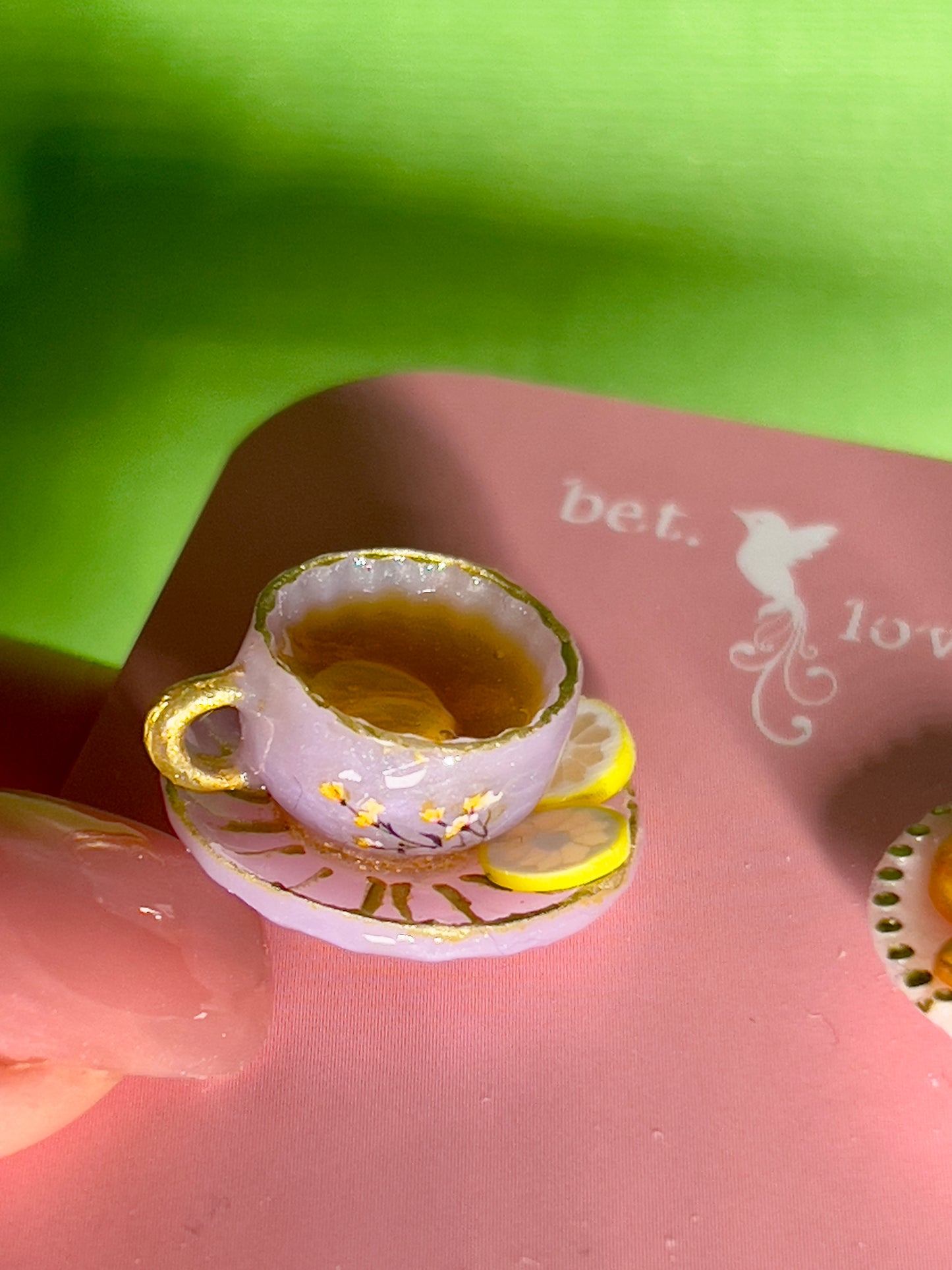 028 - Mini light purple teacup and white saucer of cookies