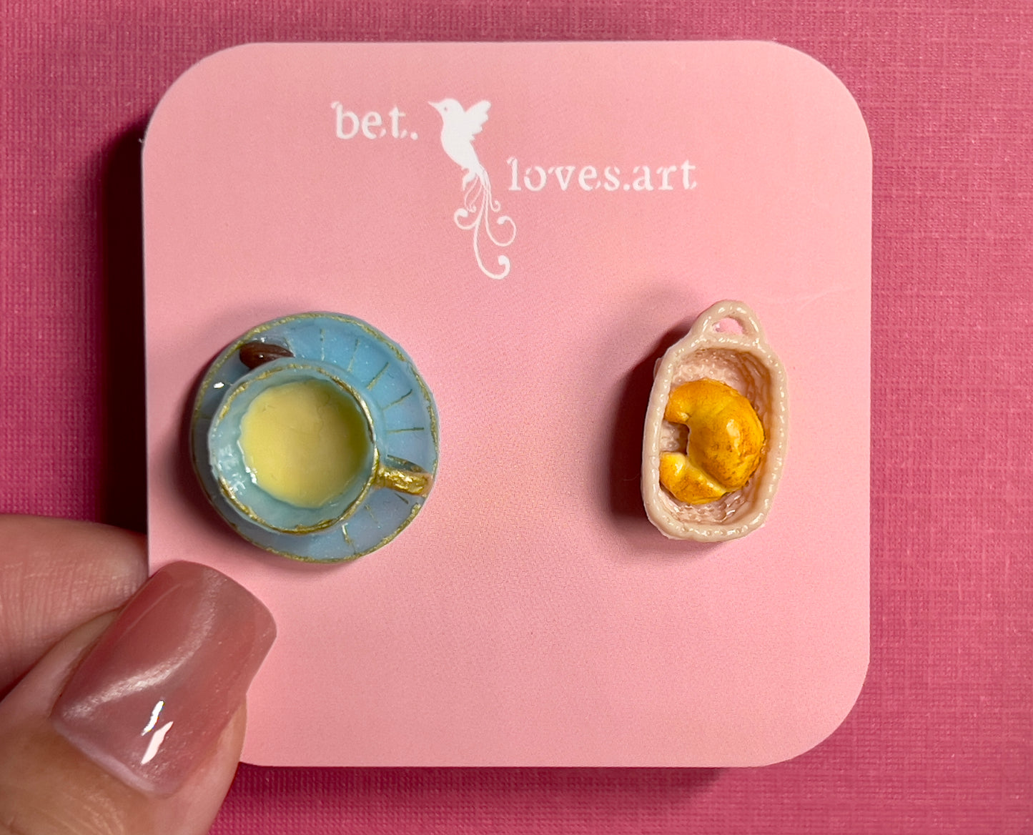020 - Mini blue teacup and a basket of croissant