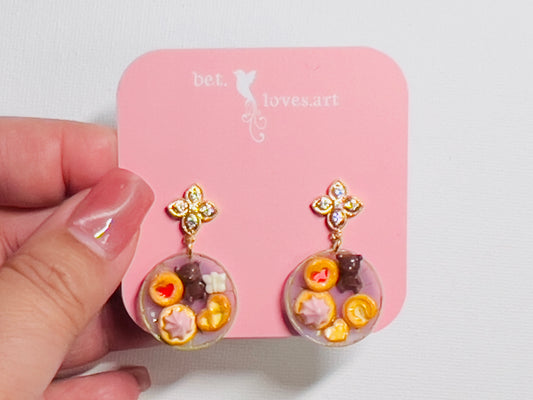044 - Mini cookie and chocolate dangle earrings on light purple plate